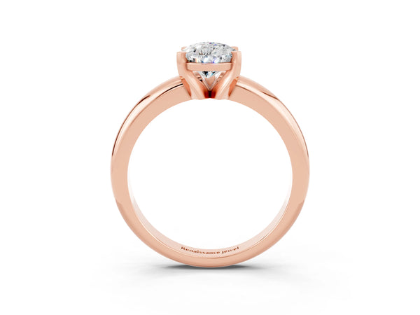 Rose gold Pear Cut Moissanite Solitaire Engagement Ring with Round Band and Four-Prong Setting