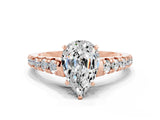 Rose gold Pear Cut Moissanite Solitaire Ring with Cathedral Setting and Pavé Band