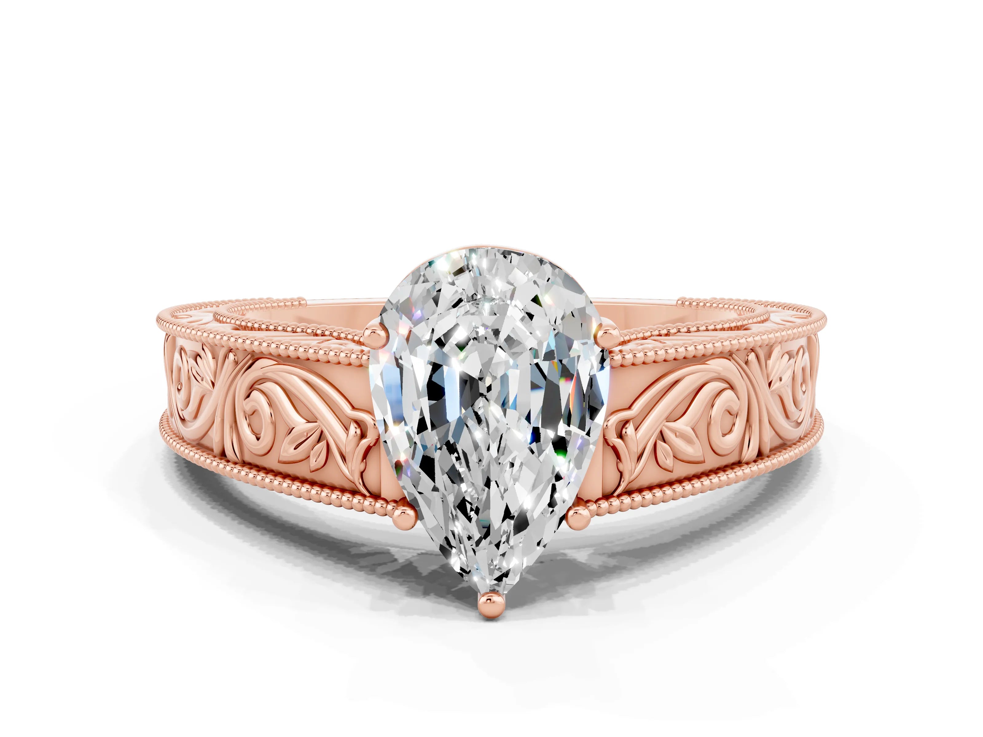 Rose gold Pear Cut Moissanite Solitaire Ring with Engraved Band and Four-Prong Setting