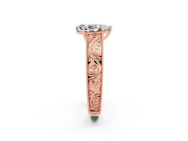 Rose gold Pear Cut Moissanite Solitaire Ring with Engraved Band and Four-Prong Setting