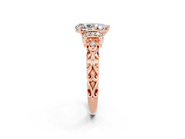 Rose gold Pear Cut Moissanite Solitaire Ring with Filigree Band and Four-Prong Setting