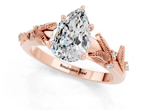 Rose gold Pear Cut Moissanite Solitaire Ring with Leaf Motif Band and Four-Prong Setting_1