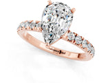 Rose gold Pear Cut Moissanite Solitaire Ring with Pavé Accents and Four-Prong Setting_1