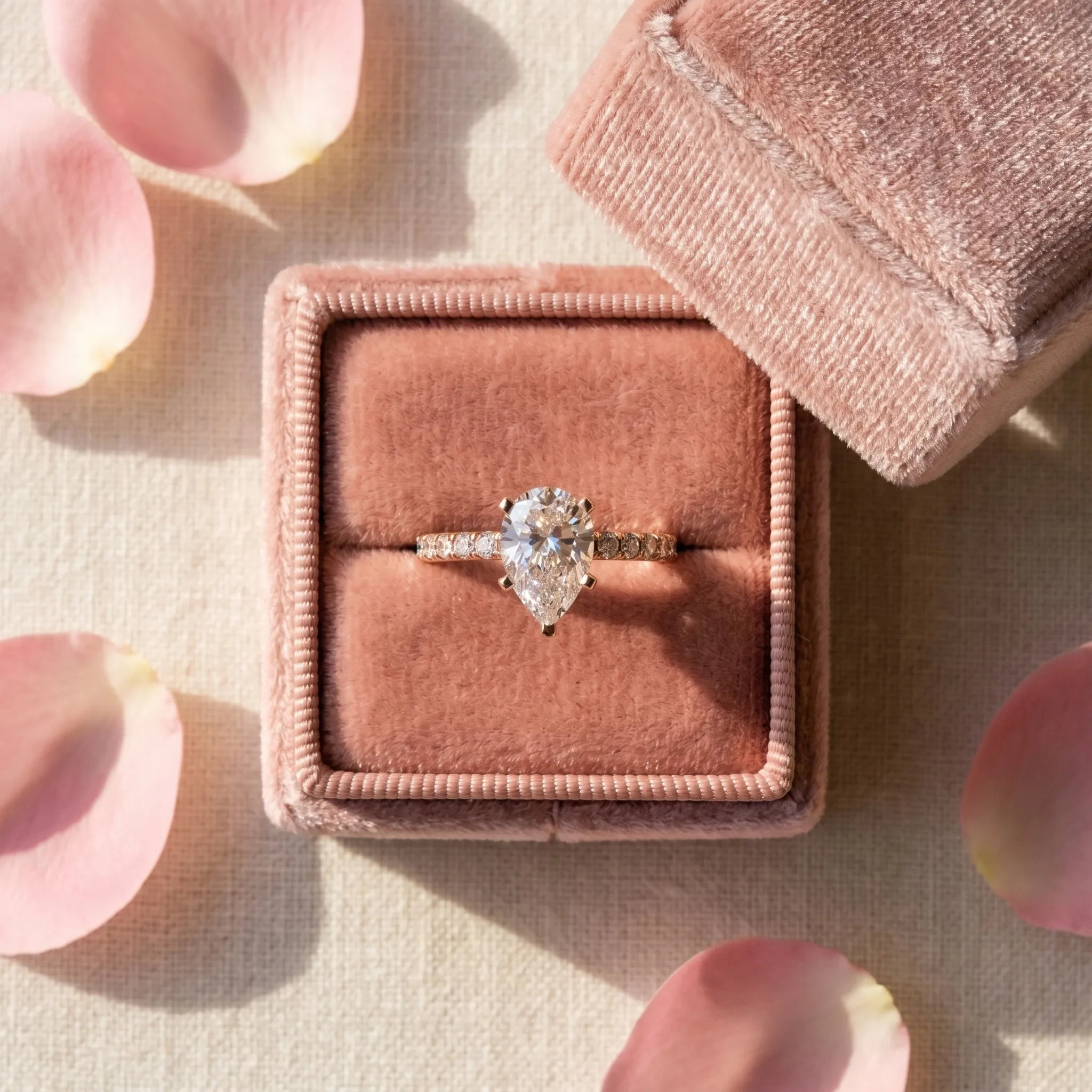 Rose gold Pear Cut Moissanite Solitaire Ring with Pavé Band and Four-Prong Setting_38