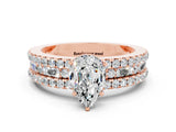 Rose gold Pear Cut Moissanite Solitaire Ring with Pavé and Channel Set Band