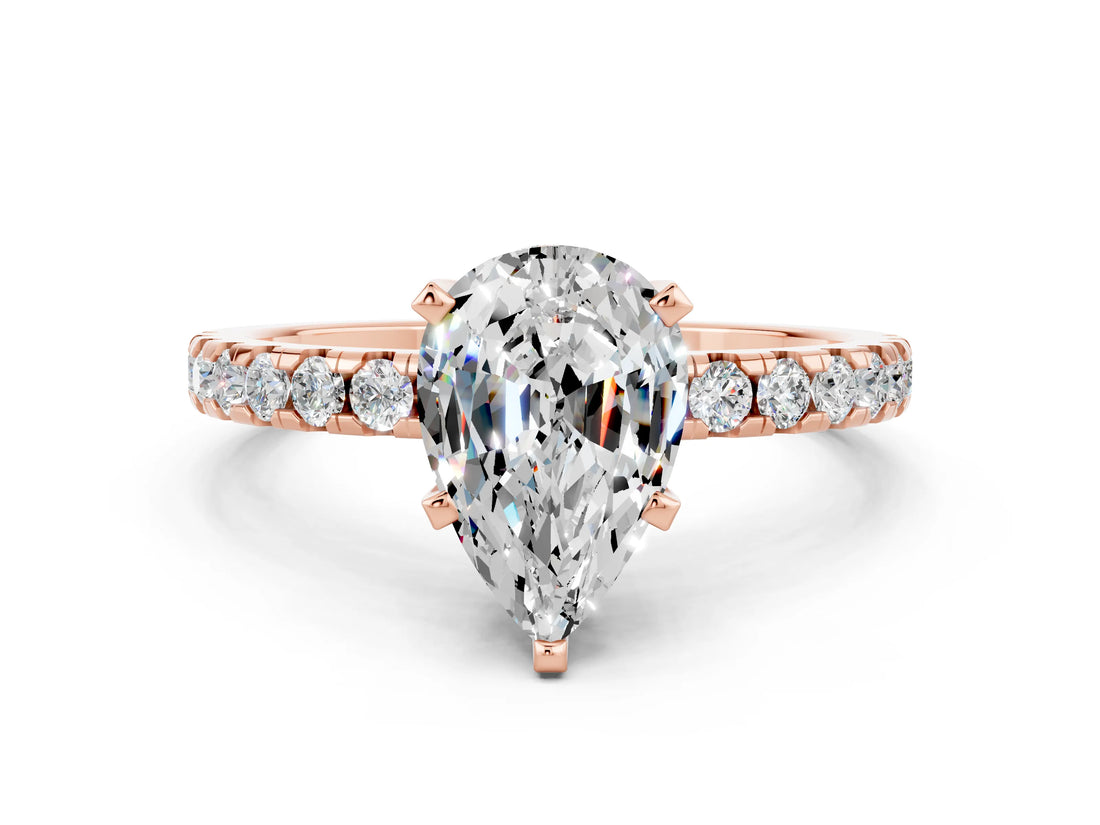 Rose gold Pear Cut Moissanite Solitaire Ring with Round  Pavé Band and Four-Prong Setting_42