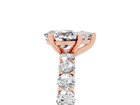 Rose gold Pear Cut Moissanite Solitaire Ring with Shared Prong Pavé Band and Four-Prong Setting_17