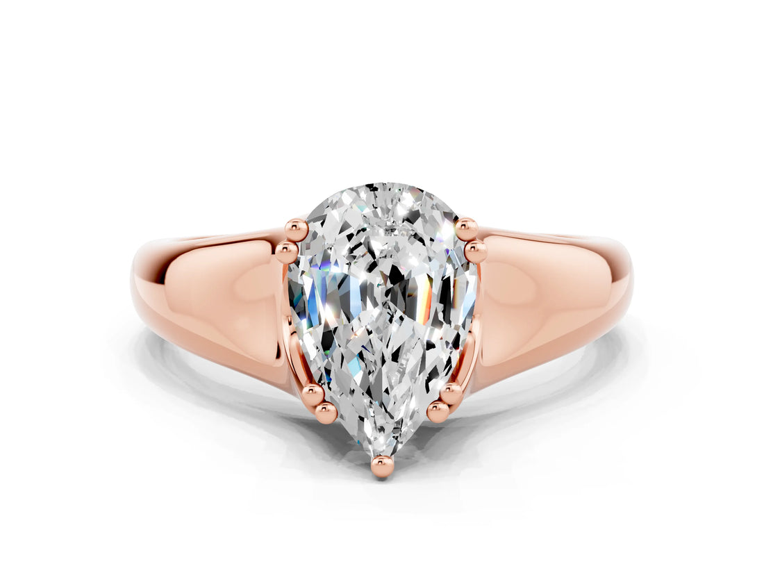 Rose gold Pear Cut Moissanite Solitaire Ring with Wide Band and Prong Setting