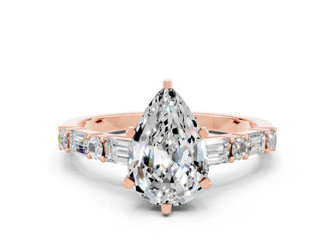 Rose gold Pear Cut Moissanite Solitaire with Side Baguettes and Channel Set Band