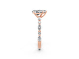 Rose gold Pear Cut Moissanite Solitaire with Side Stones on a Pavé Band and Four-Prong Setting_2