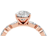Rose gold Pear Cut Moissanite Solitaire with Side Stones on a Pavé Band and Four-Prong Setting_4