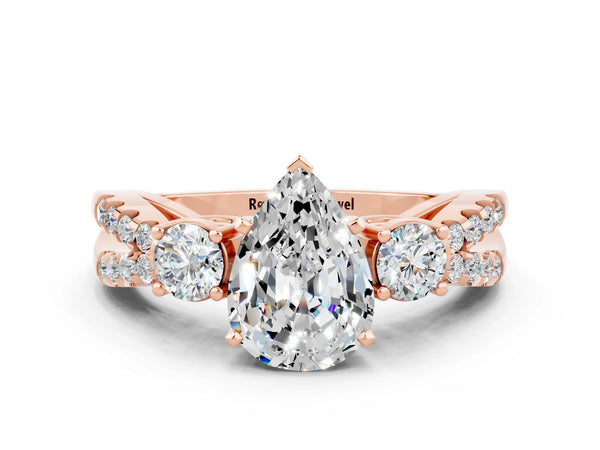 Rose gold Pear Cut Moissanite Three-Stone Ring with Pavé Split Shank and Four-Prong Setting