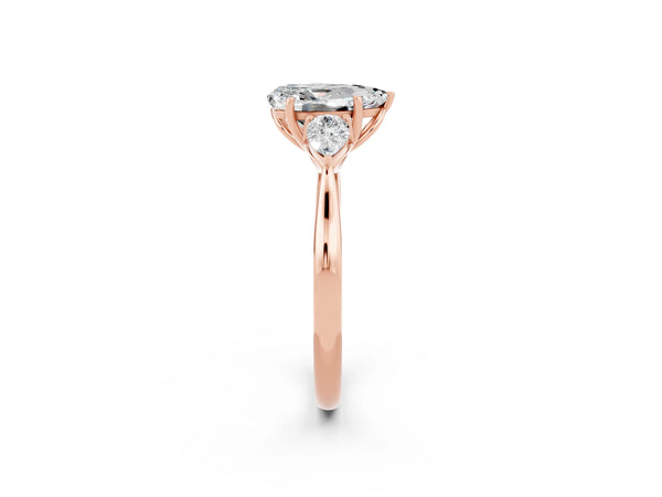 Rose gold Pear Cut Moissanite Three-Stone Ring with Pear  Side Stones and Prong Setting