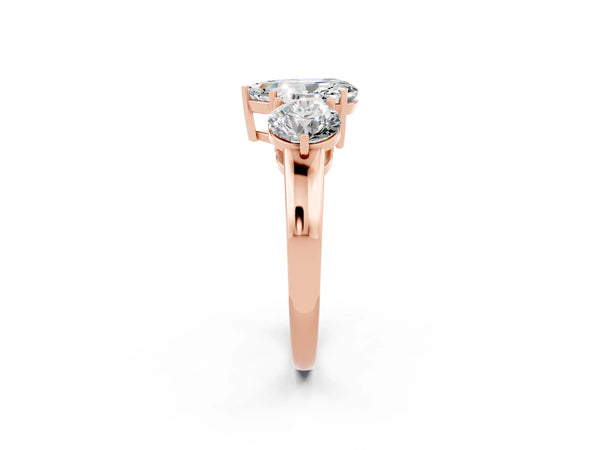 Rose gold Pear Cut Moissanite Three-Stone Ring with Prong Setting and Classic Band