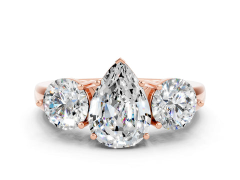 Rose gold Pear Cut Moissanite Three-Stone Ring with Prong Setting and Classic Band