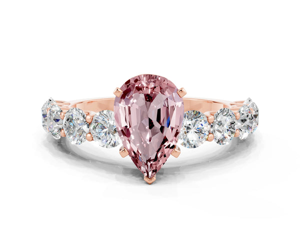 Rose gold Pear Cut Morganite Prong Setting with Side Stones on a Pave Band