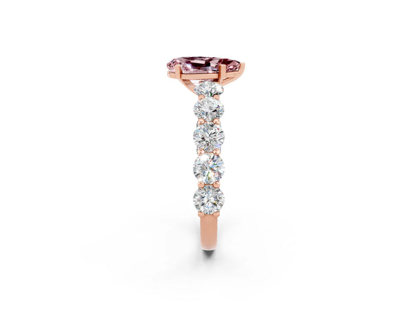Rose gold Pear Cut Morganite Prong Setting with Side Stones on a Pave Band