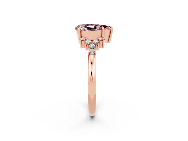 Rose gold Pear Cut Morganite Ring with Side Stones and Four-Prong Setting