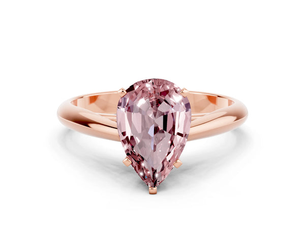 Rose gold Pear Cut Morganite Solitaire Engagement Ring with Cathedral Setting and Four-Prong Mount
