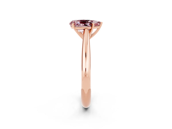 Rose gold Pear Cut Morganite Solitaire Engagement Ring with Cathedral Setting and Four-Prong Mount