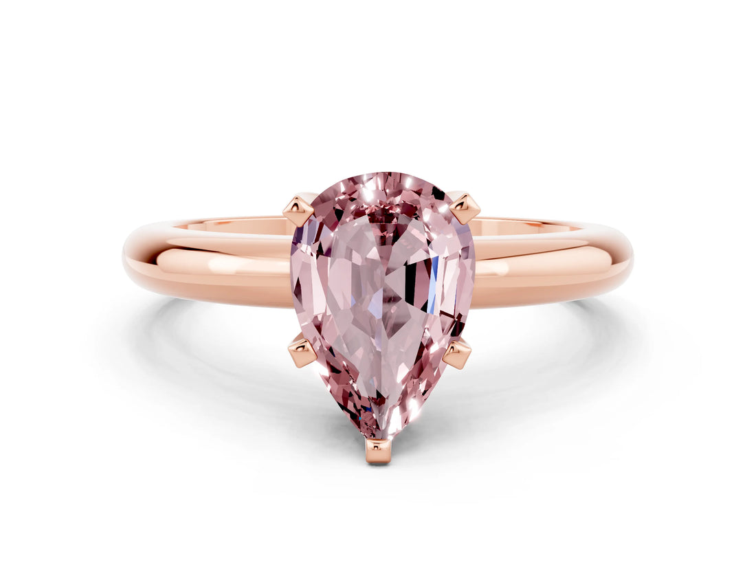 Rose gold Pear Cut Morganite Solitaire Engagement Ring with Round Band and Four-Prong Setting