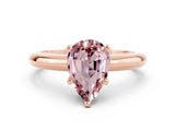 Rose gold Pear Cut Morganite Solitaire Engagement Ring with Round Band and Four-Prong Setting