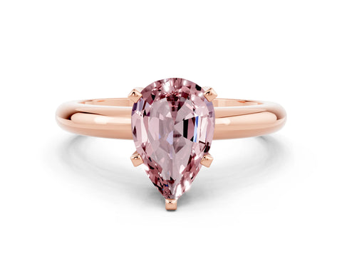 Rose gold Pear Cut Morganite Solitaire Engagement Ring with Round Band and Four-Prong Setting