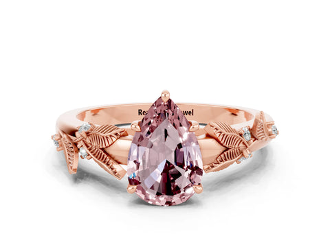Rose gold Pear Cut Morganite Solitaire Ring with Leaf Motif Band and Four-Prong Setting