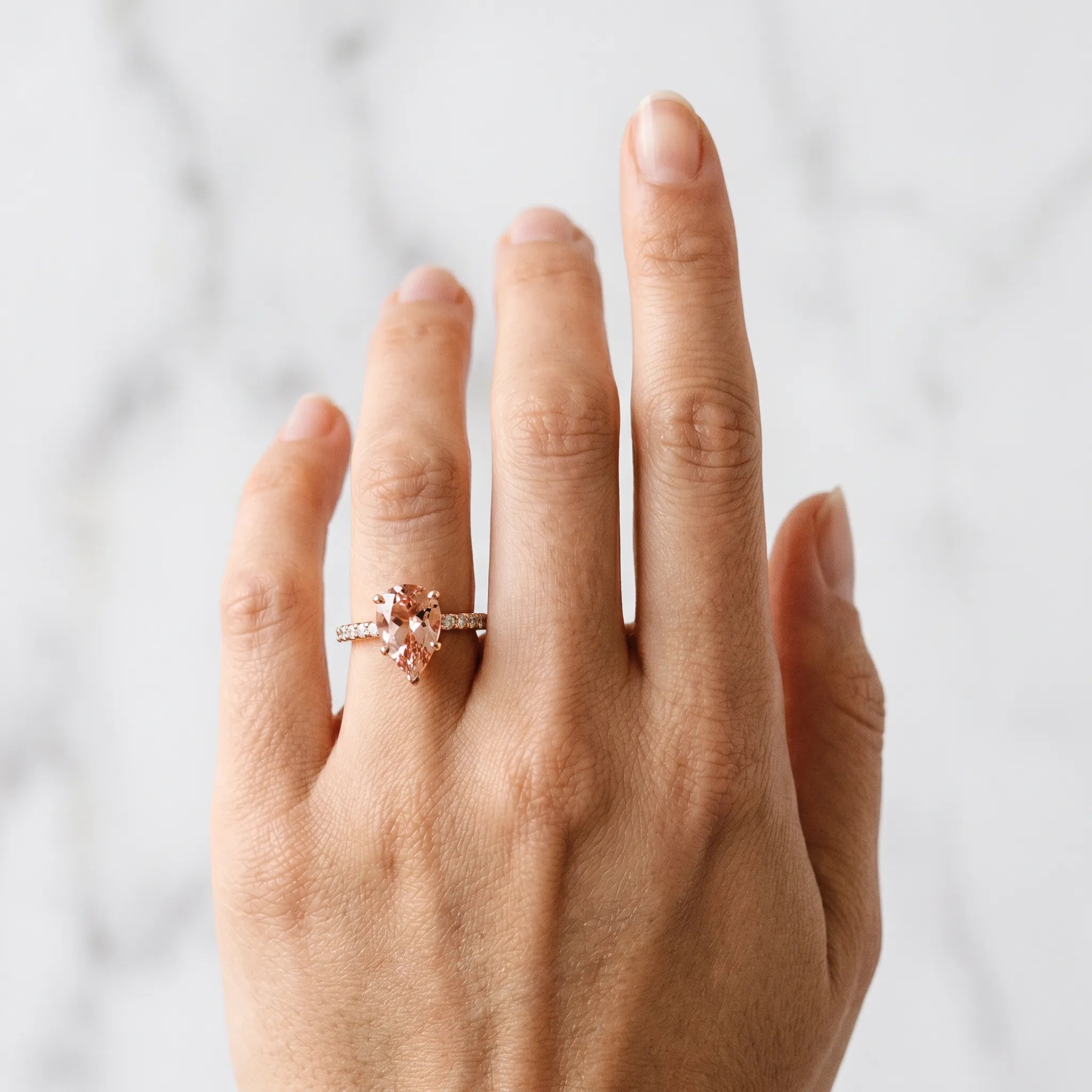 Rose gold Pear Cut Morganite Solitaire Ring with Round  Pavé Band and Four-Prong Setting_42