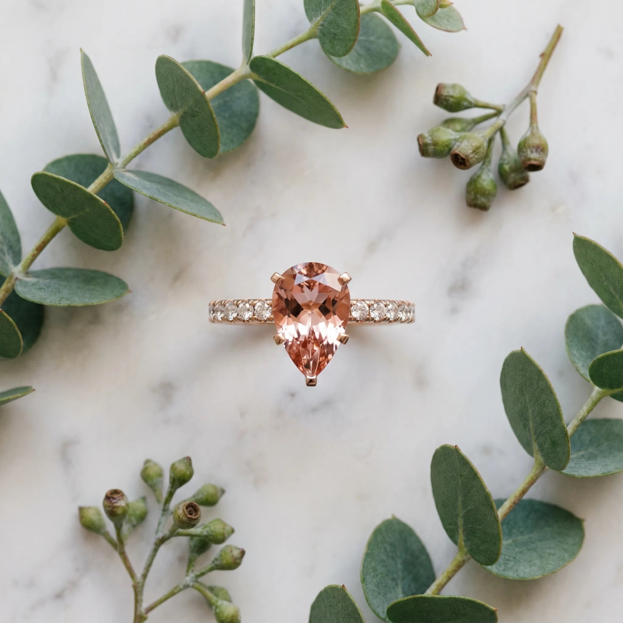 Rose gold Pear Cut Morganite Solitaire Ring with Round  Pavé Band and Four-Prong Setting_45