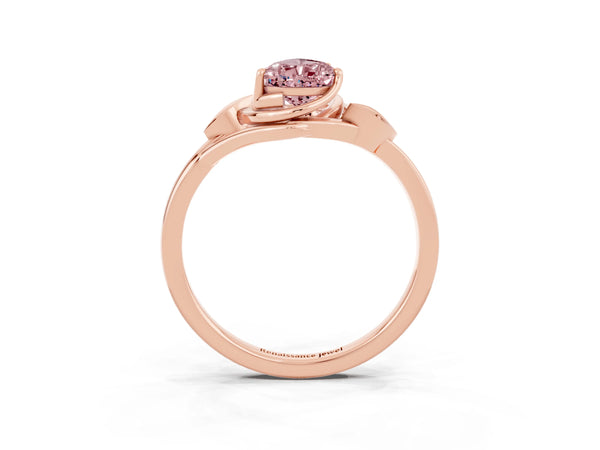 Rose gold Pear Cut Morganite Solitaire Ring with Twist Band and Four-Prong Setting