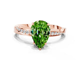 Rose gold Pear Cut Peridot Engagement Ring with Side Stone Accents and Four-Prong Setting_27