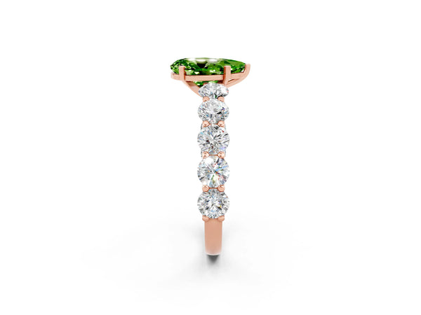 Rose gold Pear Cut Peridot Prong Setting with Side Stones on a Pave Band