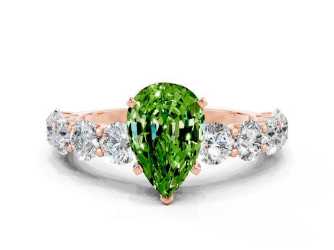 Rose gold Pear Cut Peridot Prong Setting with Side Stones on a Pave Band