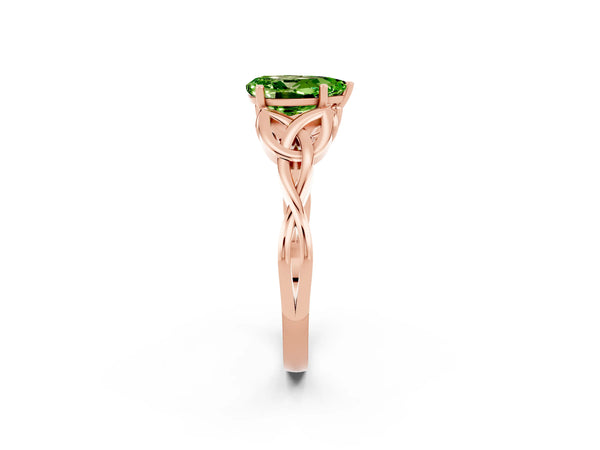 Rose gold Pear Cut Peridot Solitaire Celtic Knot Ring with Four-Prong Setting