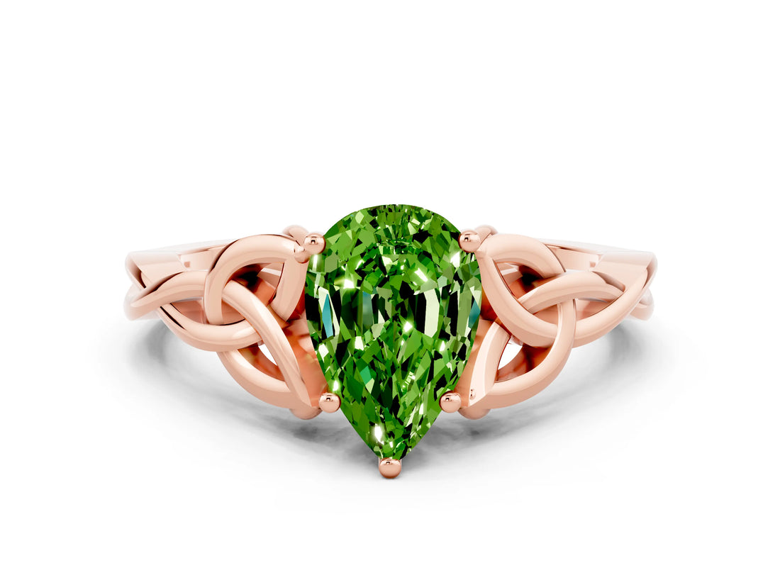 Rose gold Pear Cut Peridot Solitaire Engagement Ring with Celtic Knot Band and Four-Prong Setting