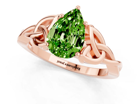 Rose gold Pear Cut Peridot Solitaire Engagement Ring with Celtic Knot Band and Four-Prong Setting_1