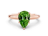 Rose gold Pear Cut Peridot Solitaire Engagement Ring with Round Band and Four-Prong Setting