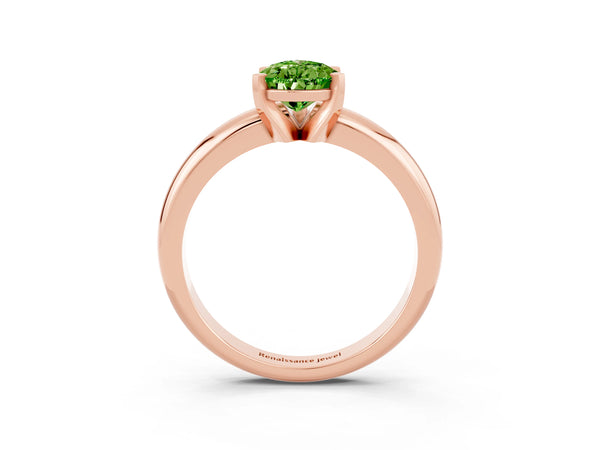 Rose gold Pear Cut Peridot Solitaire Engagement Ring with Round Band and Four-Prong Setting