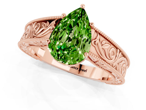 Rose gold Pear Cut Peridot Solitaire Ring with Engraved Band and Four-Prong Setting_1