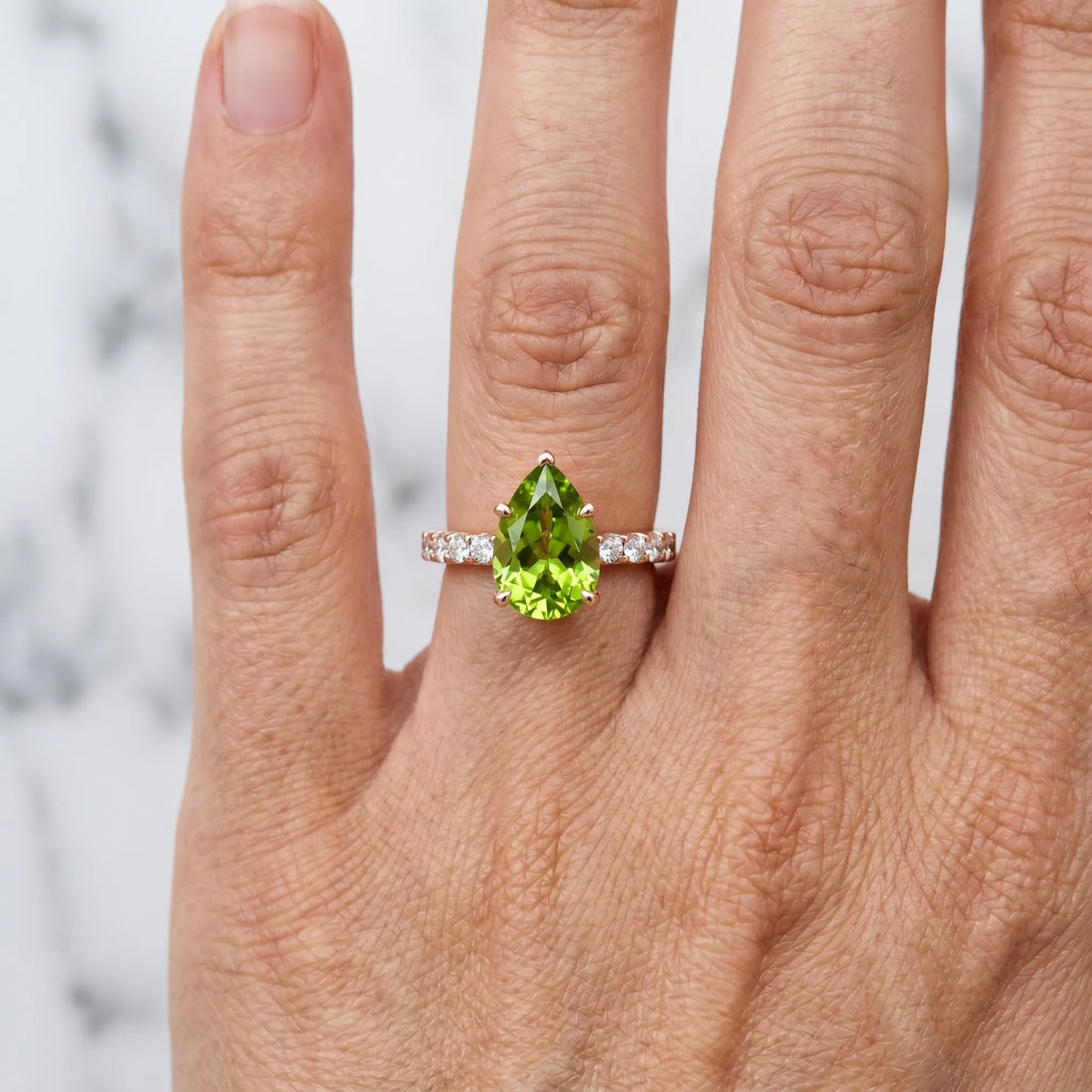 Rose gold Pear Cut Peridot Solitaire Ring with Round  Pavé Band and Four-Prong Setting_30