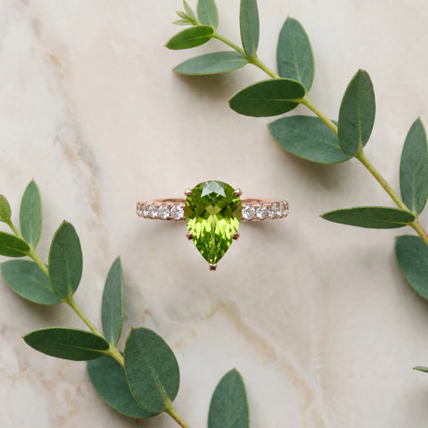 Rose gold Pear Cut Peridot Solitaire Ring with Round  Pavé Band and Four-Prong Setting_33