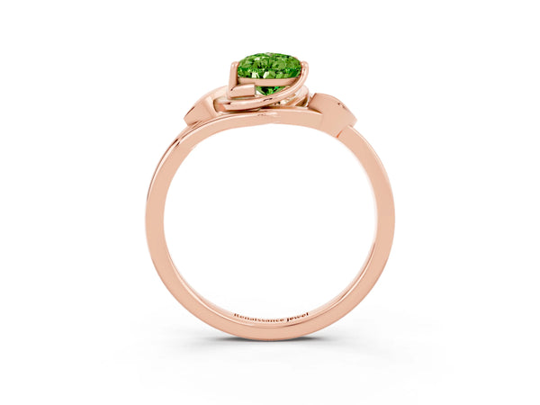 Rose gold Pear Cut Peridot Solitaire Ring with Twist Band and Four-Prong Setting