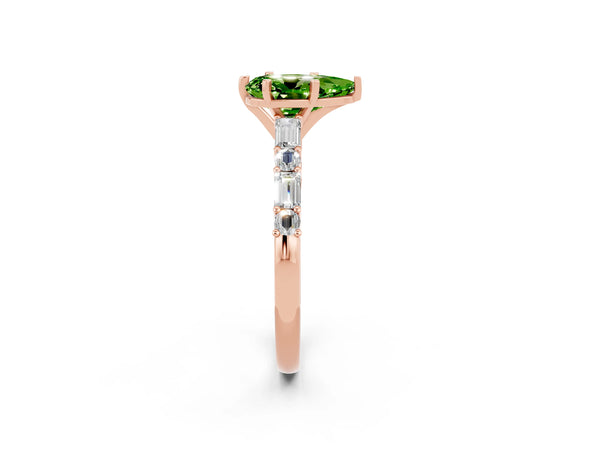 Rose gold Pear Cut Peridot Solitaire with Side Baguettes and Channel Set Band