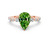 Rose gold Pear Cut Peridot Solitaire with Side Stones on a Pavé Band and Four-Prong Setting