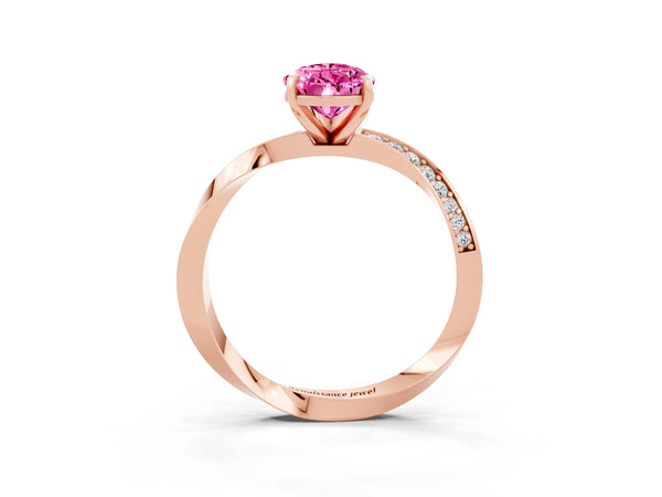 Rose gold Pear Cut Pink Sapphire Engagement Ring with Side Stone Accents and Four-Prong Setting
