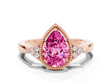 Rose gold Pear Cut Pink Sapphire Halo Ring with Tapered Band and Four-Prong Setting
