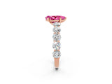 Rose gold Pear Cut Pink Sapphire Prong Setting with Side Stones on a Pave Band_26