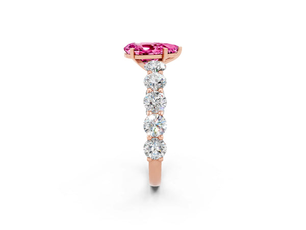 Rose gold Pear Cut Pink Sapphire Prong Setting with Side Stones on a Pave Band