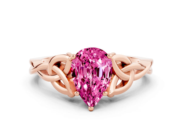 Rose gold Pear Cut Pink Sapphire Solitaire Engagement Ring with Celtic Knot Band and Four-Prong Setting